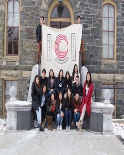 Students with banner for ECAASU 2018 